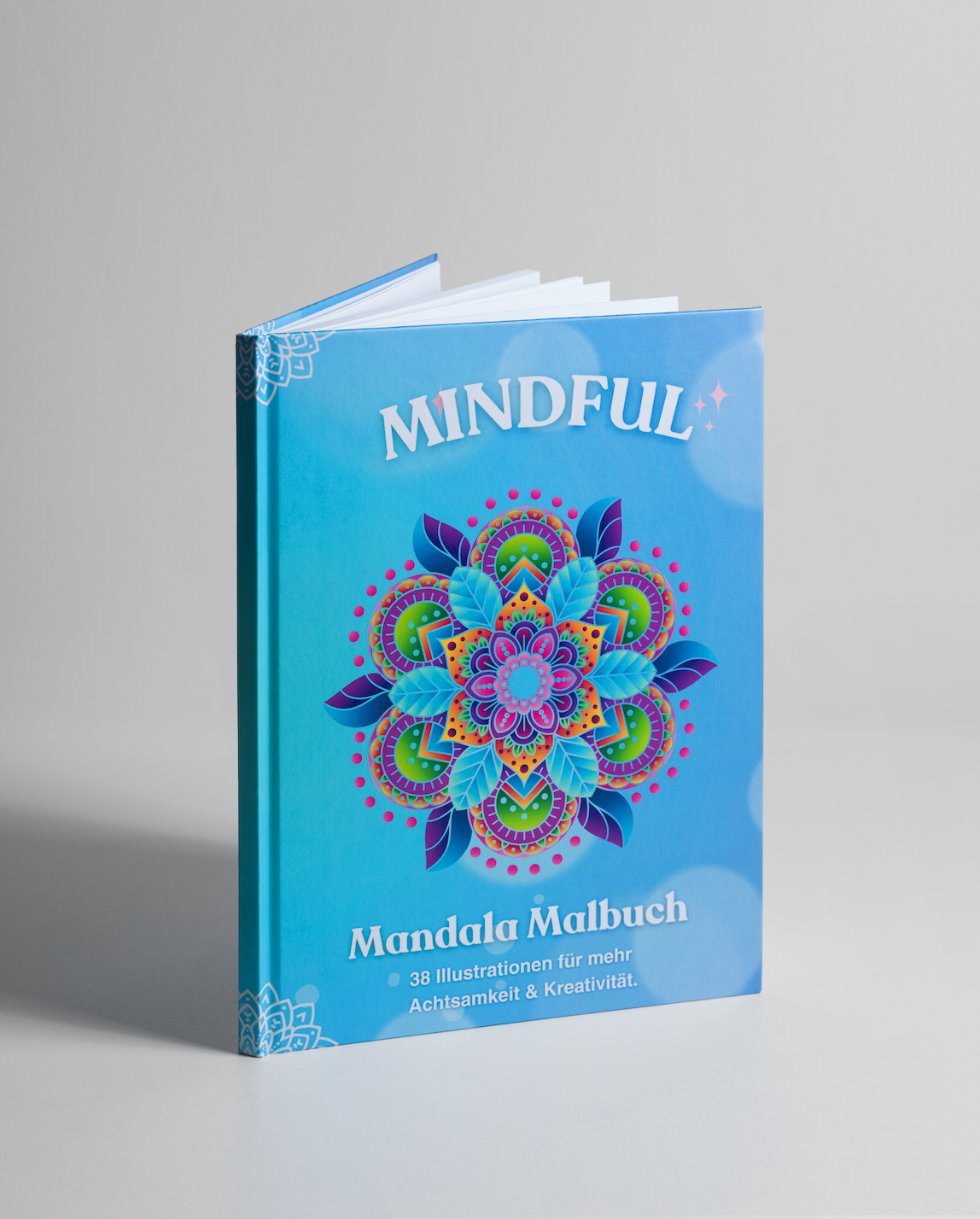 Mindful Mandala Malbuch mit farbigem Mandala auf blauem Cover, kreatives Ausmalbuch mit 38 Mandala Illustrationen für Achtsamkeit, Entspannung, Stressabbau und kreatives Malen im Hier und Jetzt.